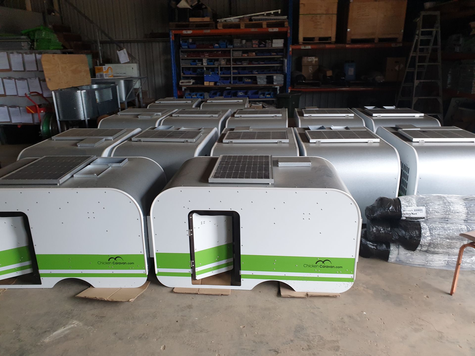 Chicken Caravan 10s all lined up in workshop awaiting to be packed up and shipped out