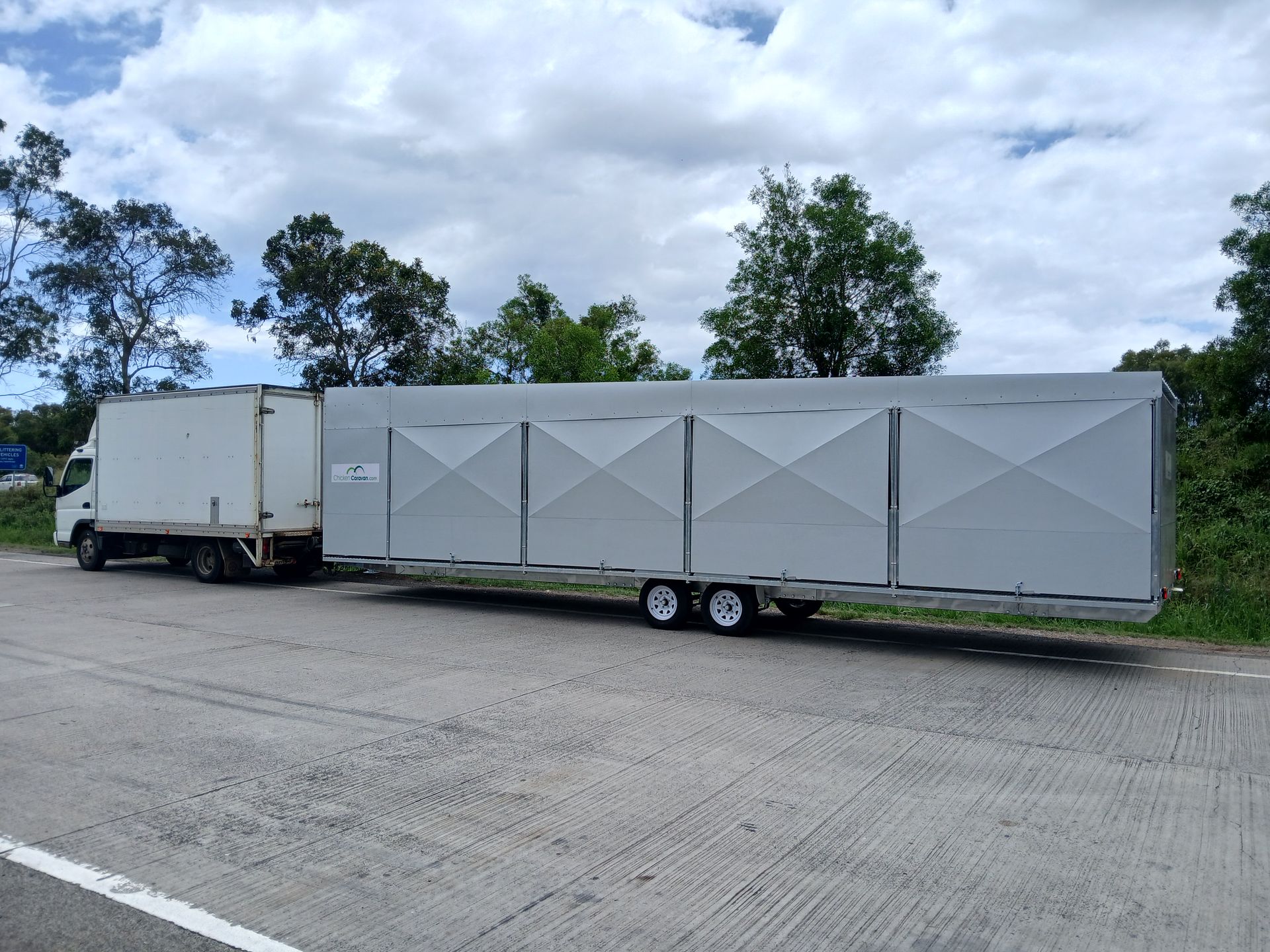 Chicken Caravan 600 being towed for a delivery