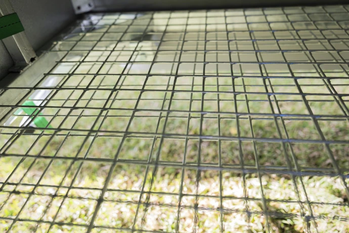 Double mesh floor to help prevent a fox taking a chicken - added security