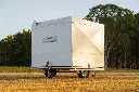 Chicken-Caravan-130-doors-closed-side-back-view-logo
